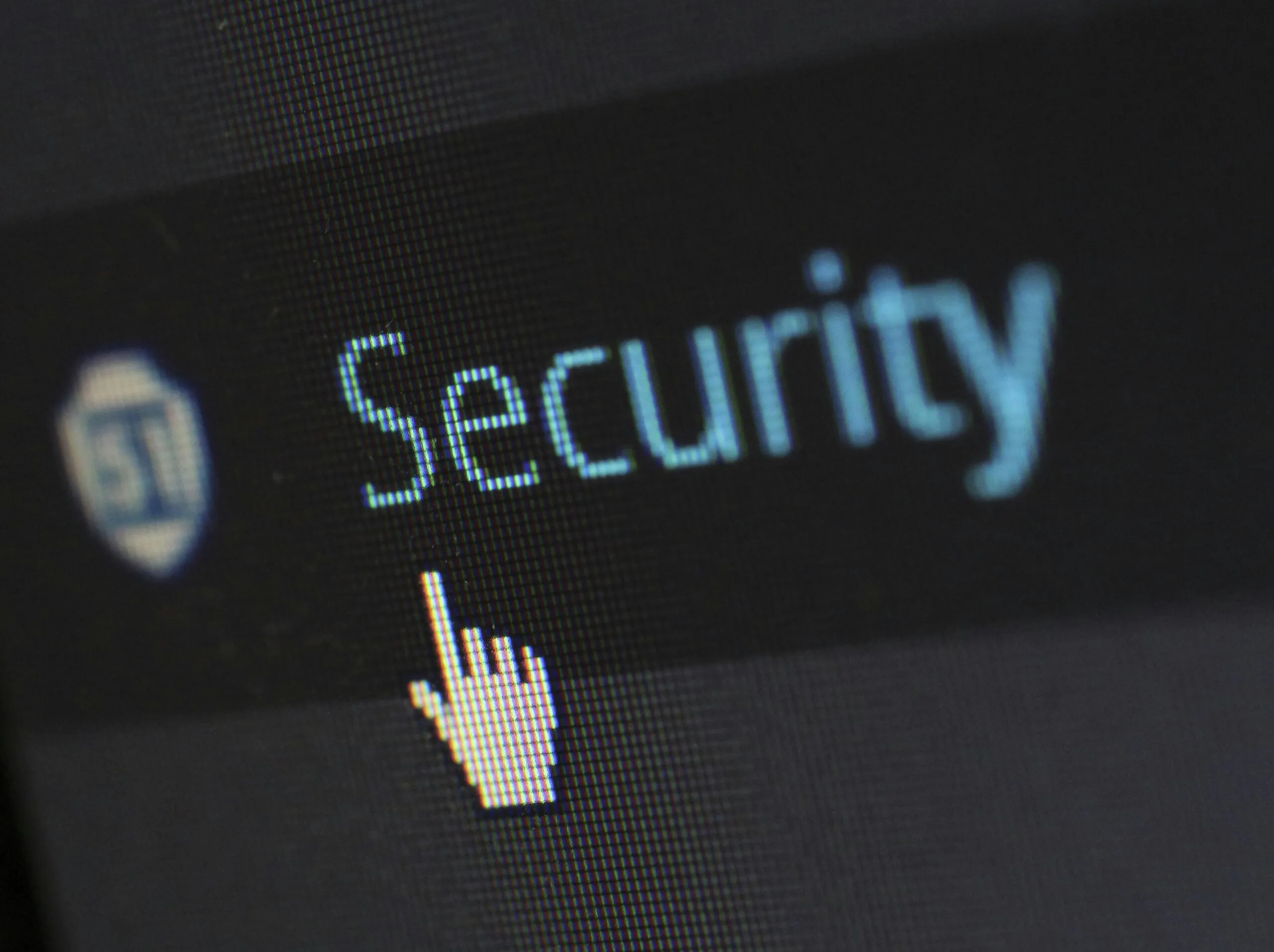 security typed in blue on a black background with cursor hand